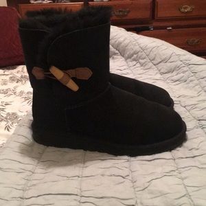 Black Uggs with wooden buckle